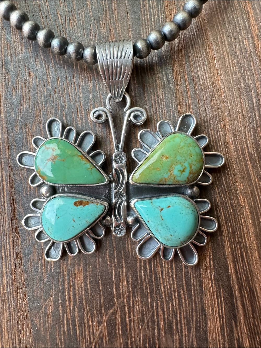 Sterling Silver Butterfly Pendant with Turquoise Stones